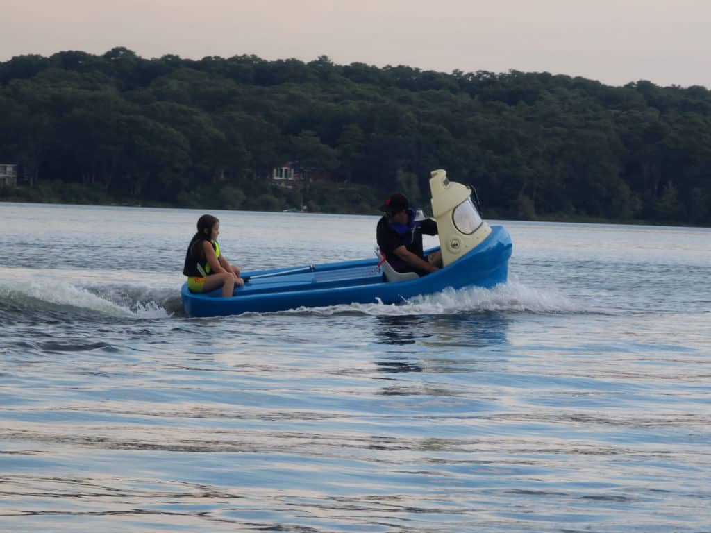 Rusty takes his daughter out boating