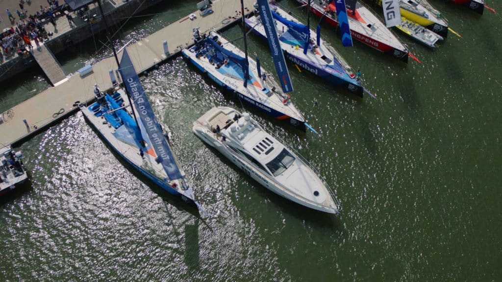 Self-docking boat backing into a slip