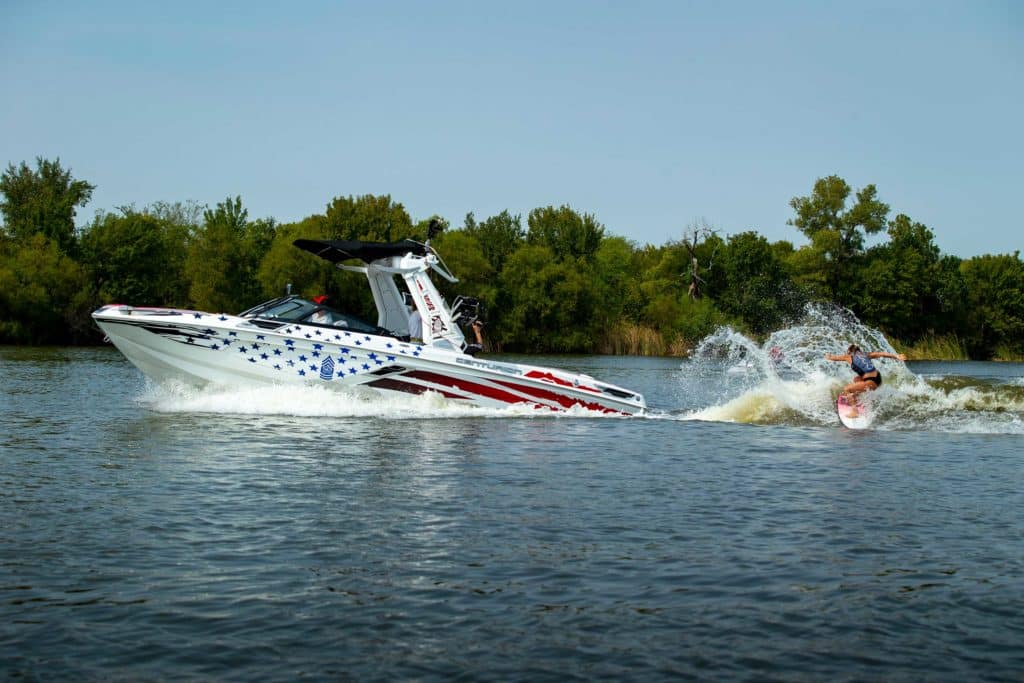 Ashley Kidd wakesurfing behind a Centurion boat