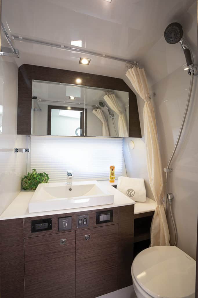 Courtesy Cruisers Yachts head and shower