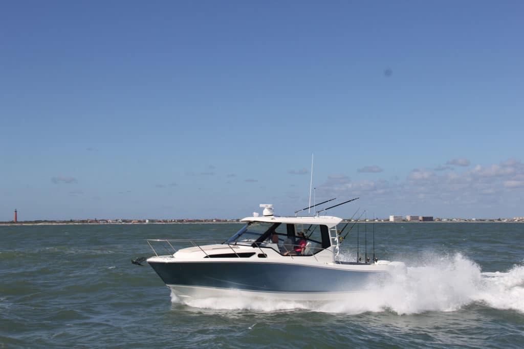 Boston Whaler 325 Conquest running shot