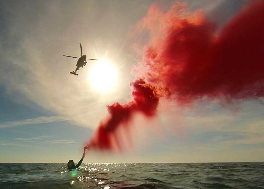 Boater signaling for help with flare