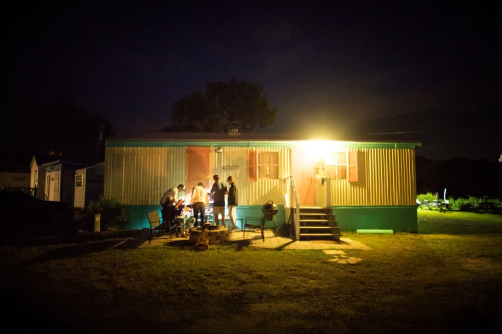 Jamming and cooking by moonlight around the fire