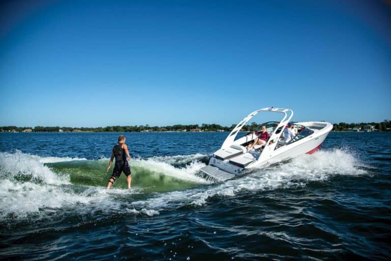 Wakesurfing behind a Regal boat