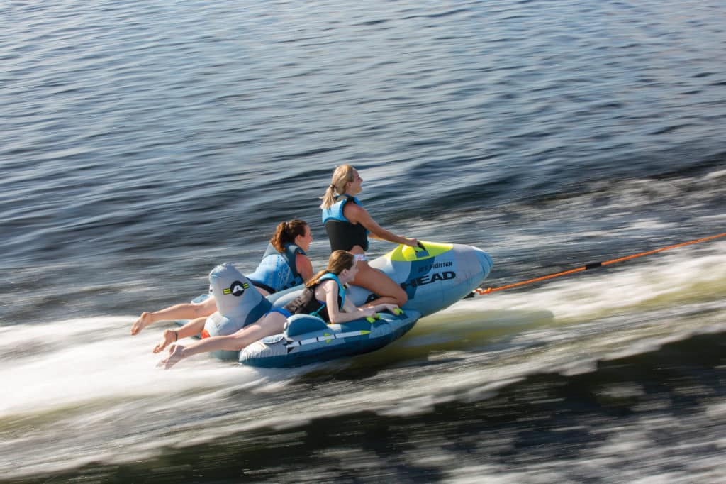 Airhead Jet Fighter going fast behind the boat