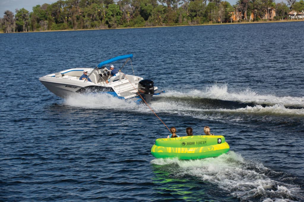 Inflatable tube being pulled behind boat