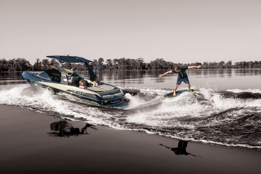 Wakesurfing behind a boat