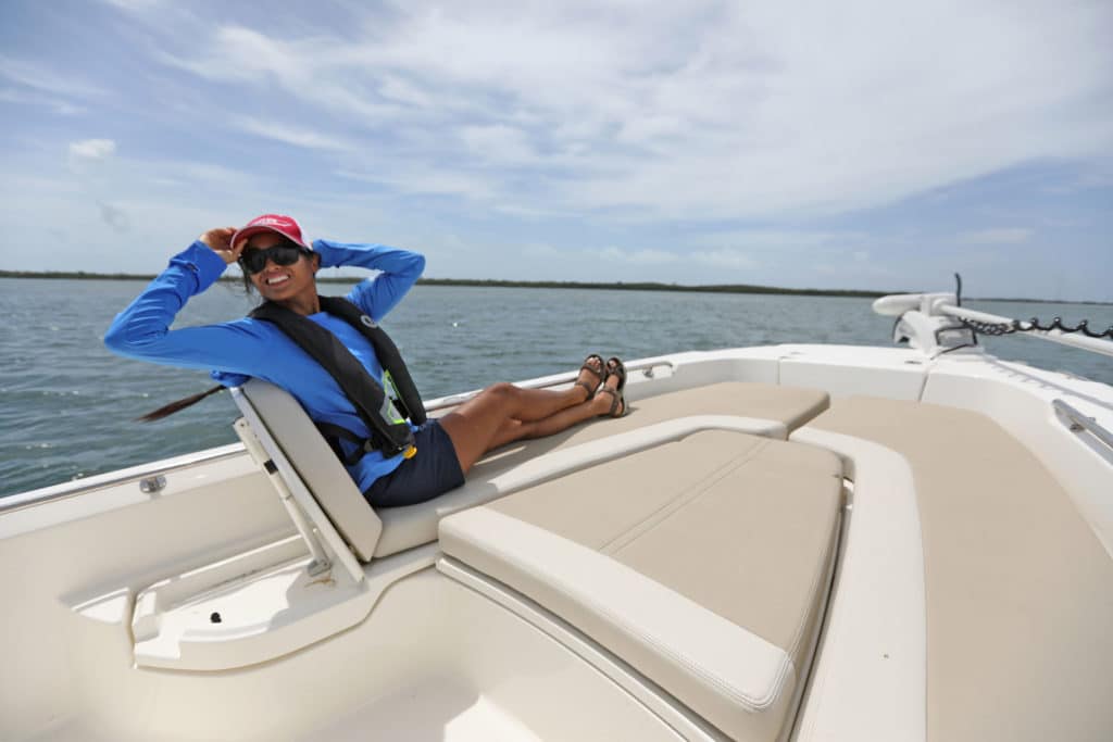 Boater lounging on forward seats