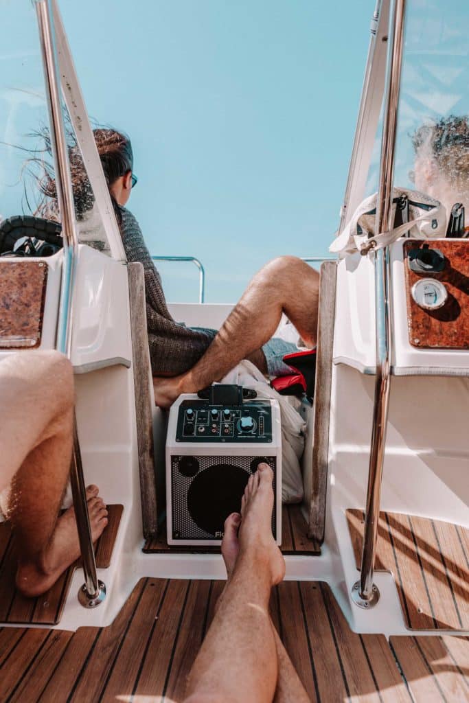 Boaters listening to radio on boat