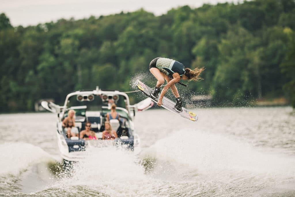 Meagan Ethell catching air behind the boat