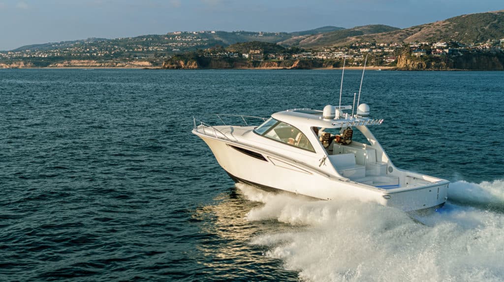 Mag Bay Yachts 42 Hardtop running off the beach