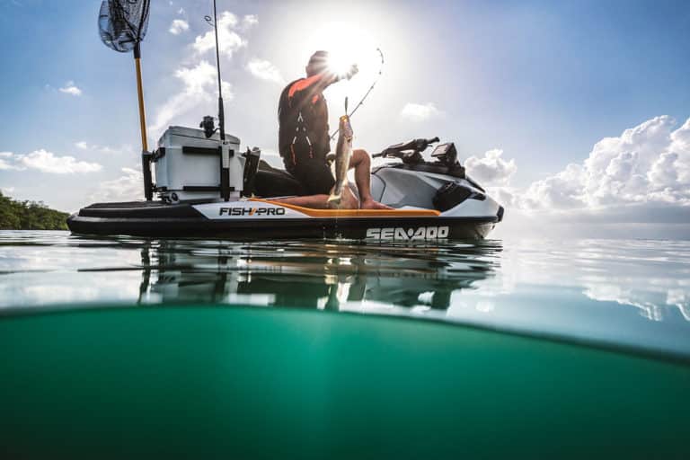 Hoisting a fish aboard a Sea-Doo