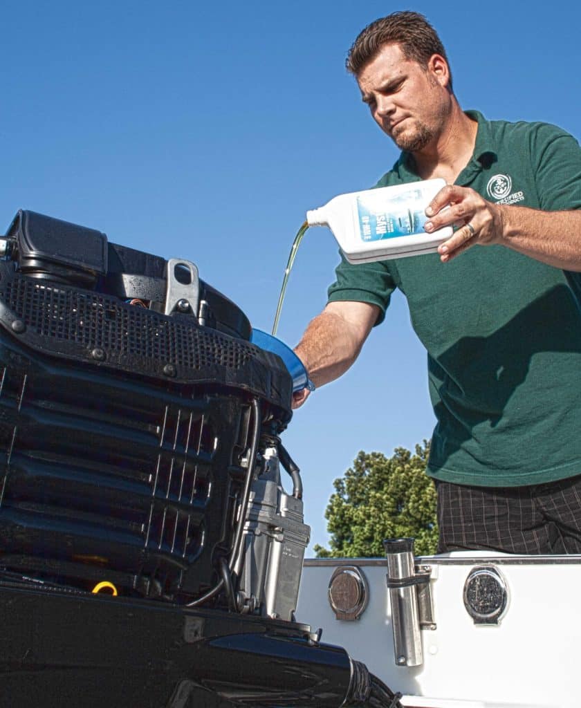 Changing fluids on an outboard