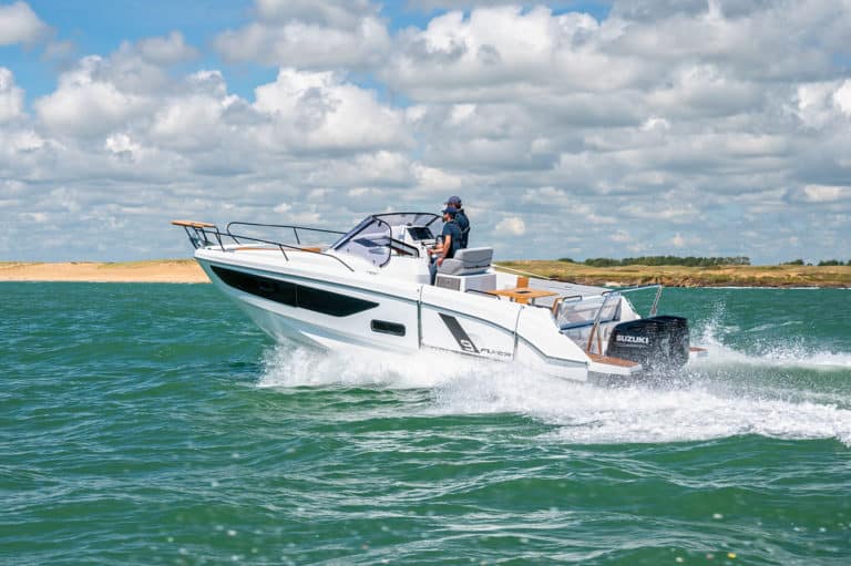 Beneteau Flyer 9 Sundeck cruising through emerald green waters