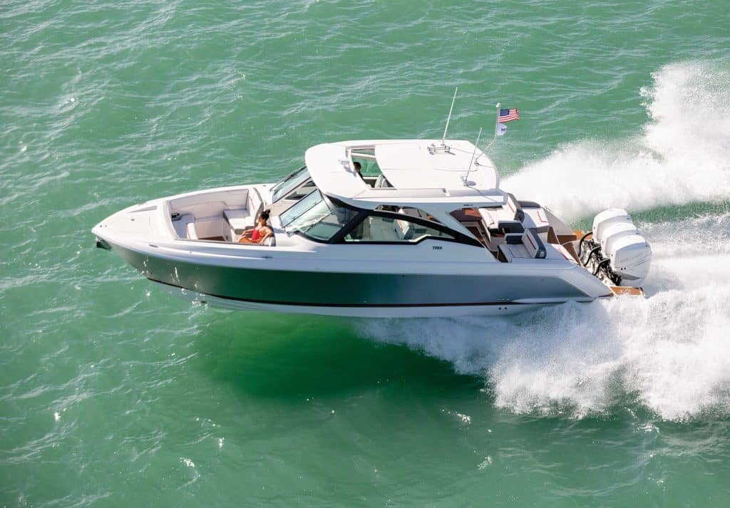 Tiara Sport 38 L boating in emerald water
