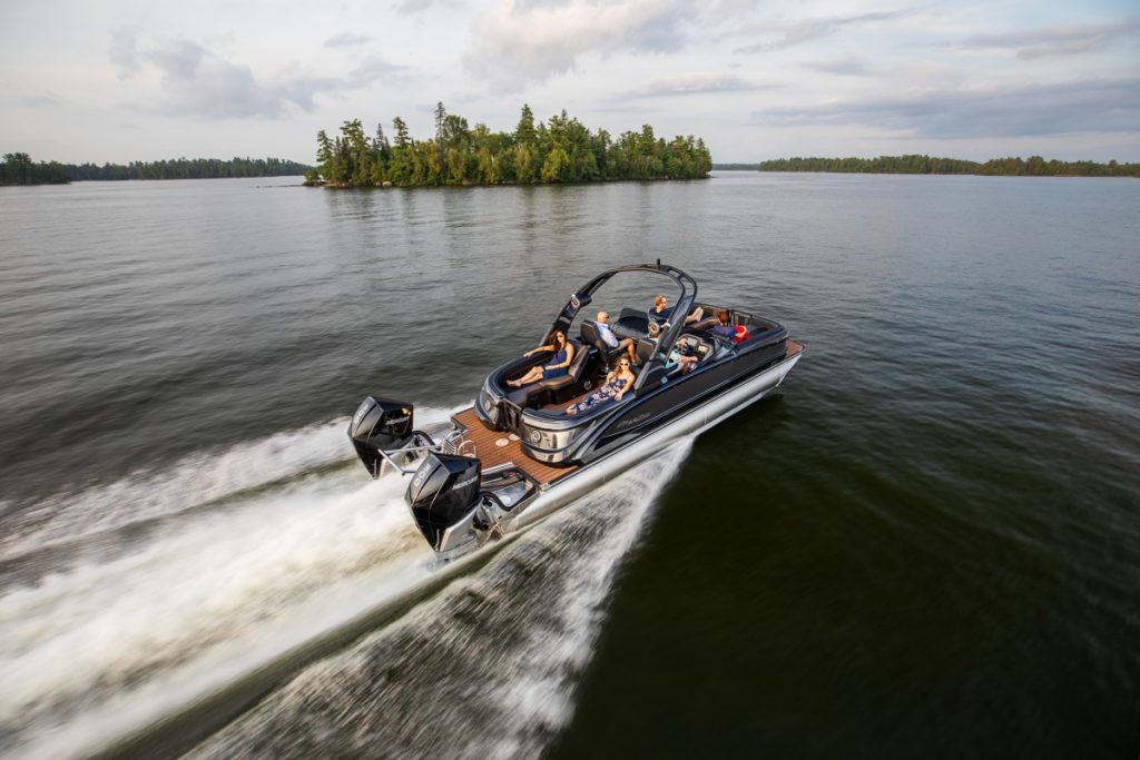 Manitou pontoon on the lake