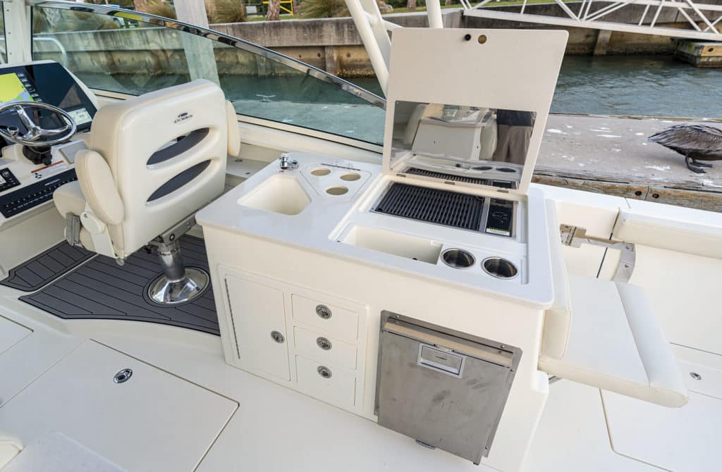 Cobia 330 Dual Console cockpit kitchen