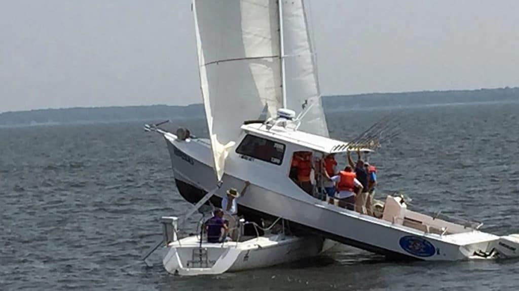 Motorboat crashed on top of sailboat