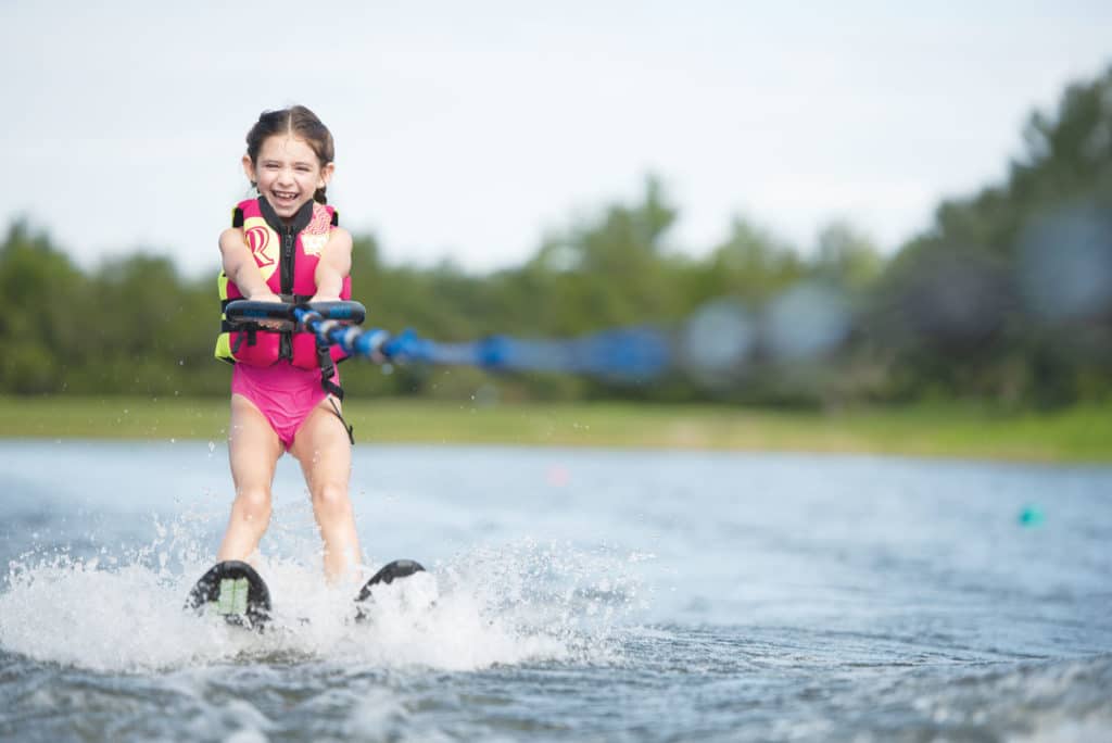 Kid learning how to ski