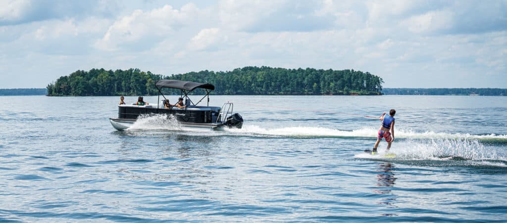 Bentley Pontoons 223 Bentley Navigator pulling a wakeboarder