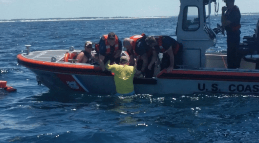 USCG Rescues People After Boat Sinks
