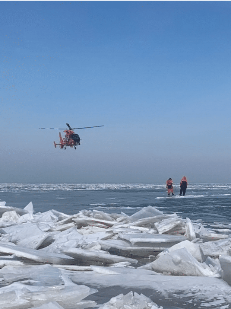 USCG Helo rescues ice fishermen adrift on floe