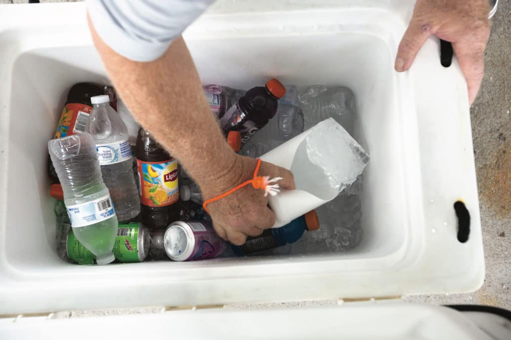 Using a jug to scoop ice