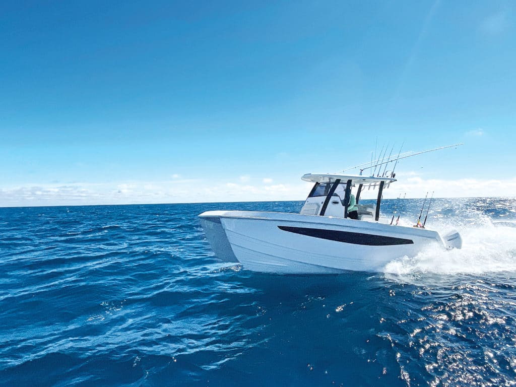 Aquila 28 Molokai Power Catamaran running in the ocean