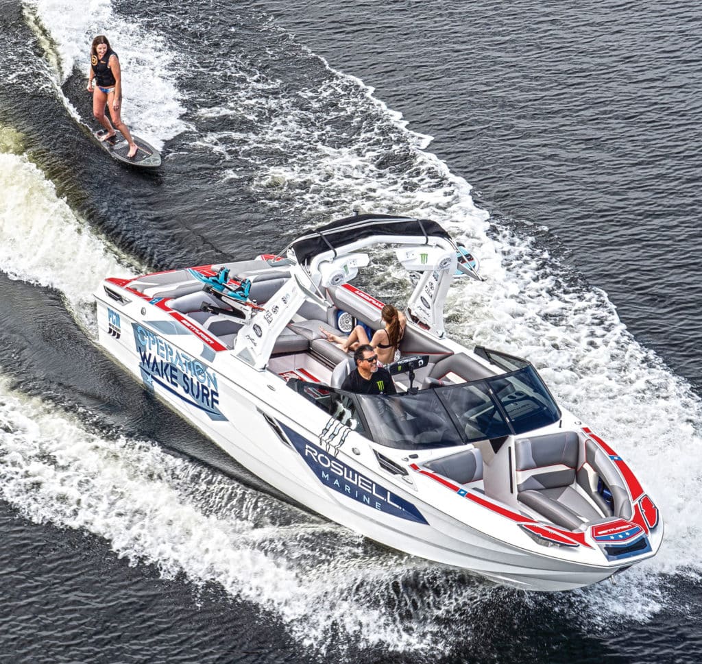 Wakesurfing behind a boat