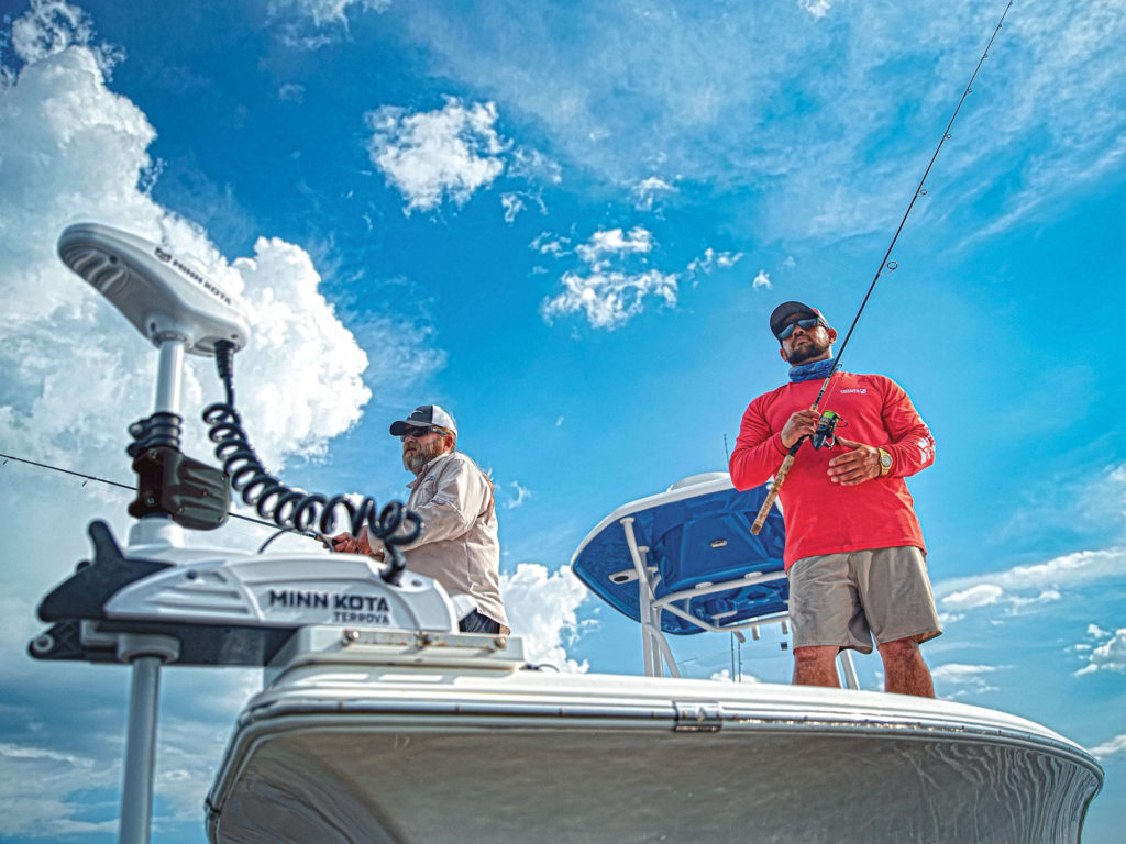 Anglers fishing with a trolling motor