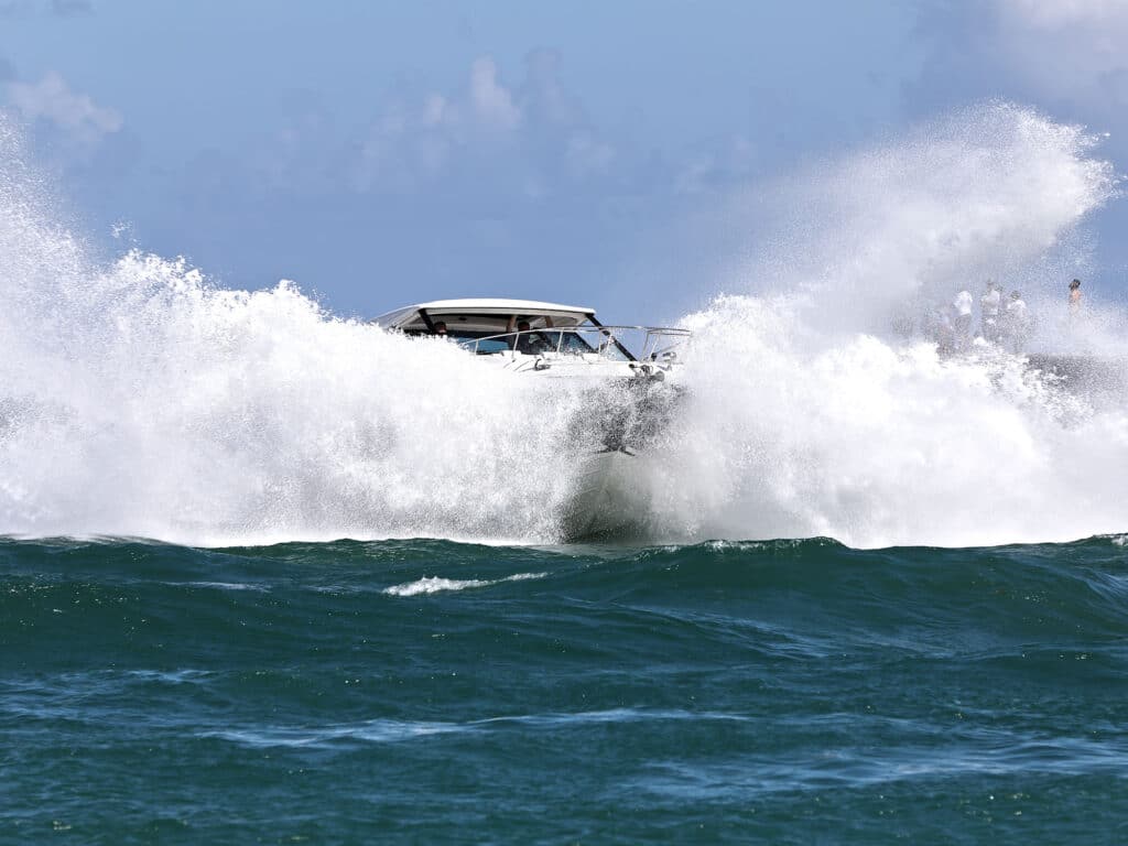 Boat running through a rough inlet