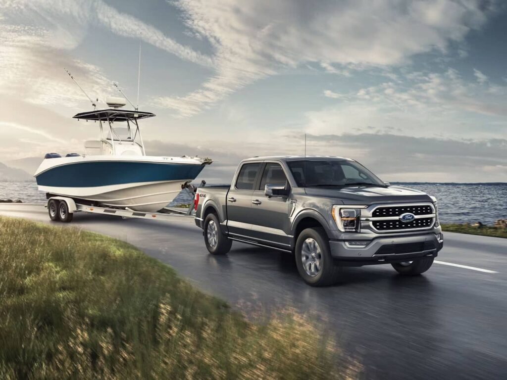 Ford truck towing a boat