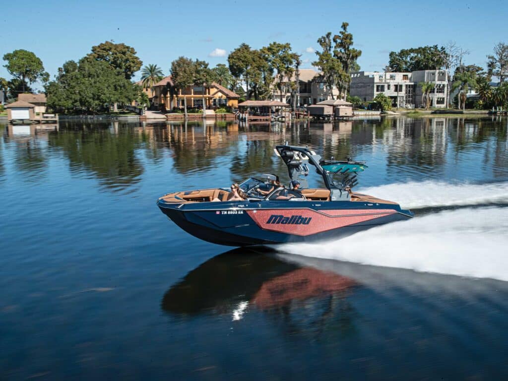 Malibu M242 on a glassy lake