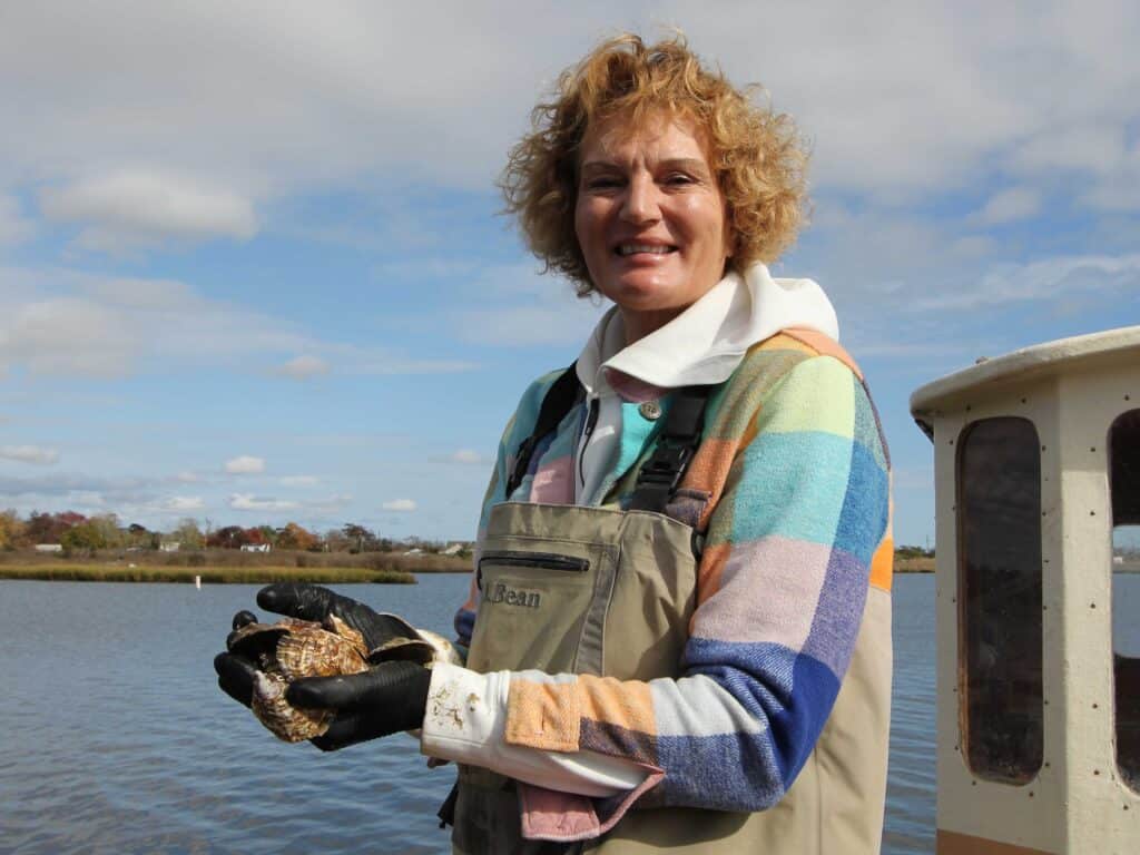 Sue Wicks holding oysters