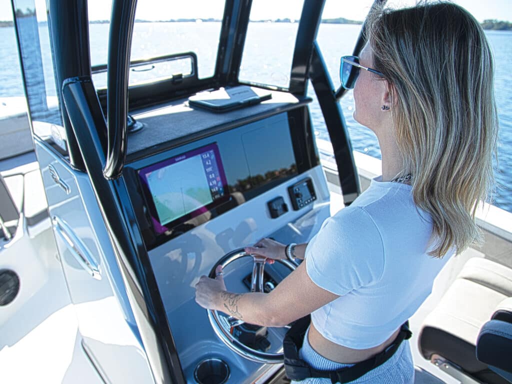 Young boater at the helm