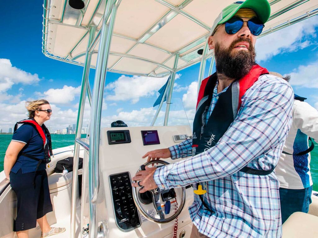 Boaters at the helm