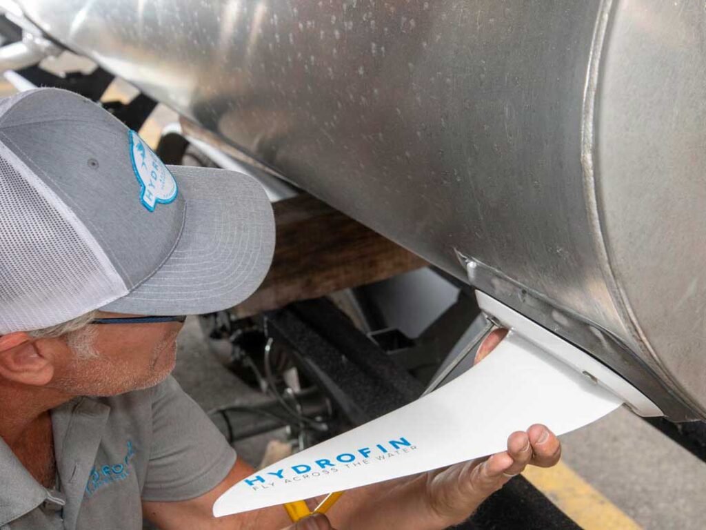 Installing a hydrofoil on a pontoon tube