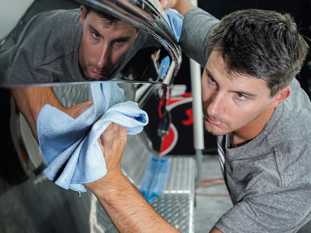 Owner boat waxing