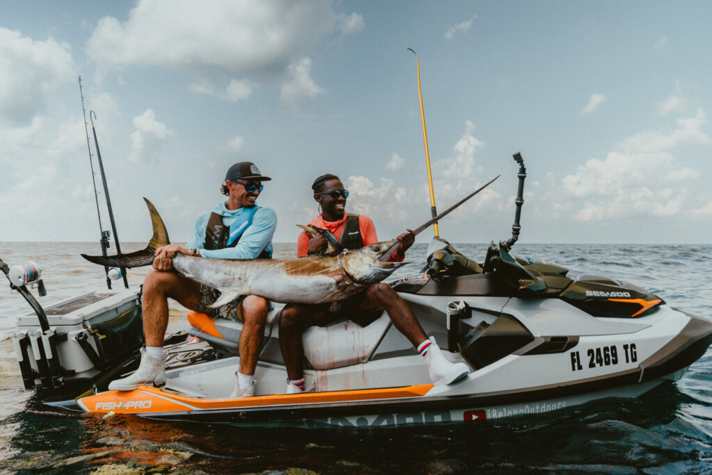 Emmanuel Williams with swordfish on a PWC