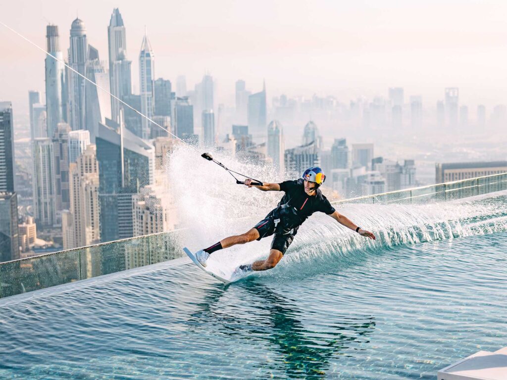 Brian Grubb wakeskating on a rooftop in Dubai