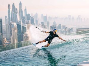 Brian Grubb wakeskating on a rooftop in Dubai