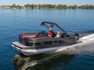 Bennington 24 MFB Sport on a lake