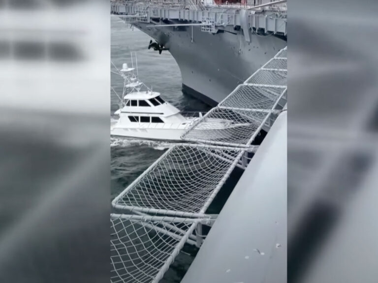 Sportfishing boat rams USS Midway