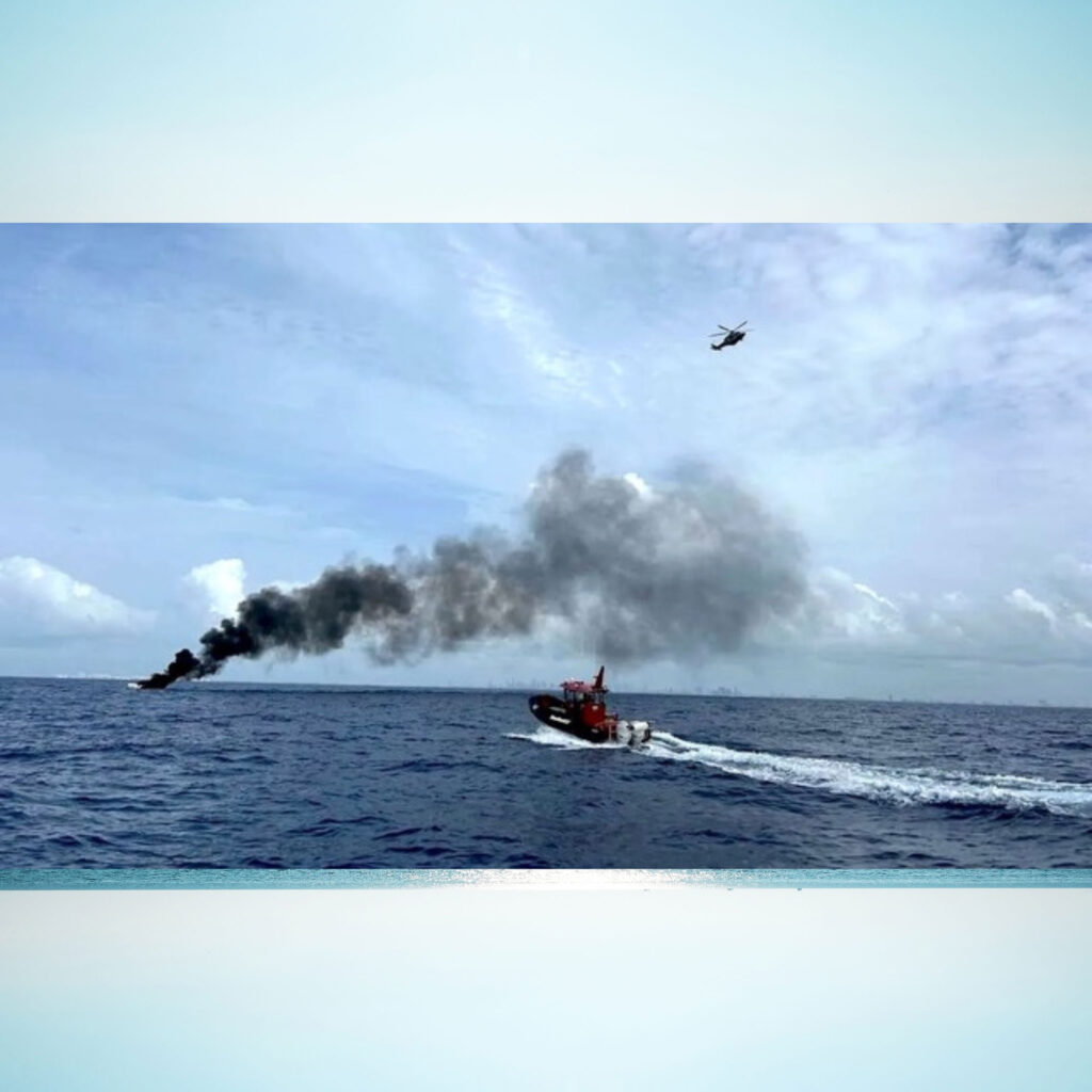 Coast Guard approaching a boat fire